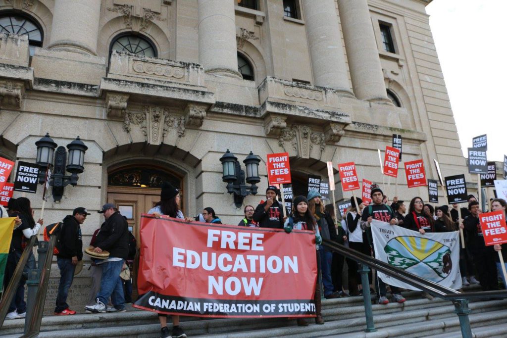 Members of URSU, FNUniv SA, and the CFS stand on the steps of the Legislative Assembly of Saskatchewan to demand a freeze on tuition increase and the rising cost of education  on November 3, 2016.
