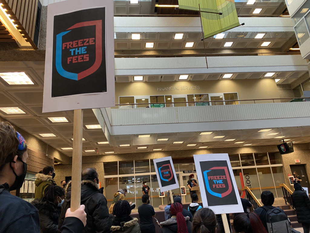 In front of Financial Services and within earshot of the President's Office, students protesting the lack of services received for the abhorrent fees paid and the unequal costs faced by International Students gather in the Ad Hum building of the University of Regina Main Campus February 2nd, 2022.